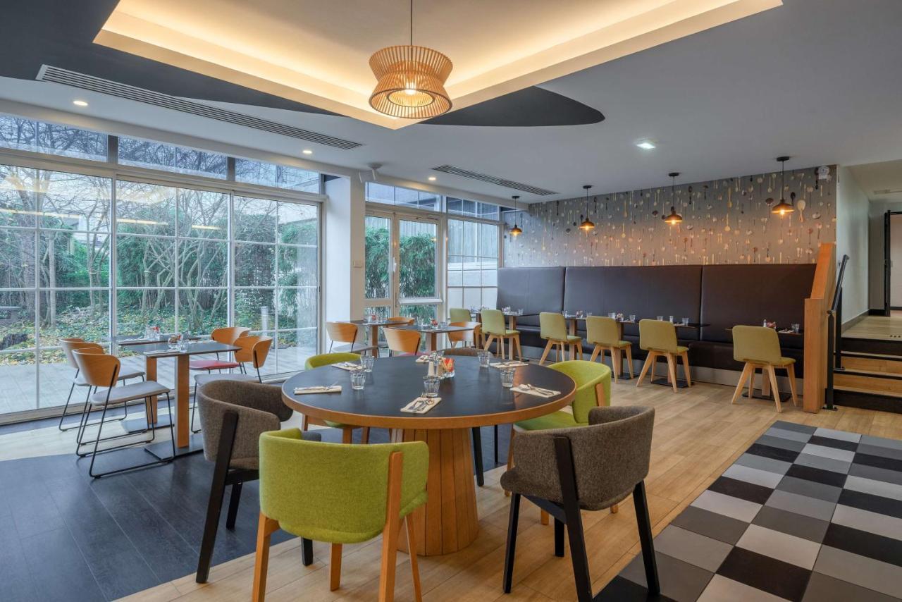 Отель Doubletree By Hilton Paris Буживаль Экстерьер фото
